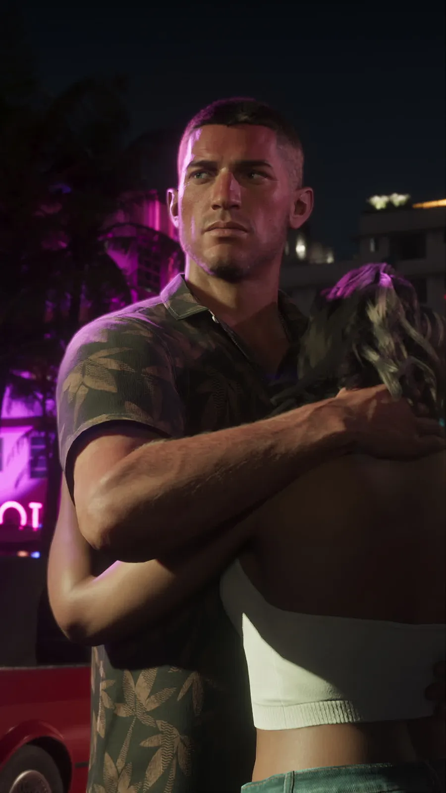 Jason Duval embracing Lucia under purple light in an official GTA VI image.